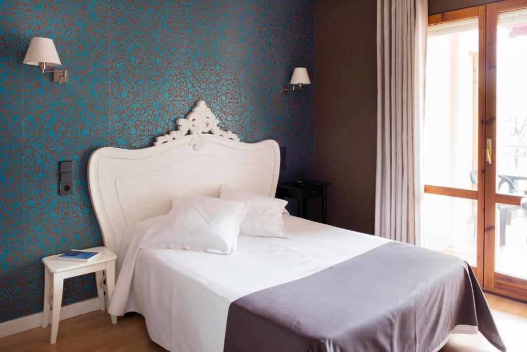 Hospedium Hostal Un Punto Chic Huesca Quarto foto