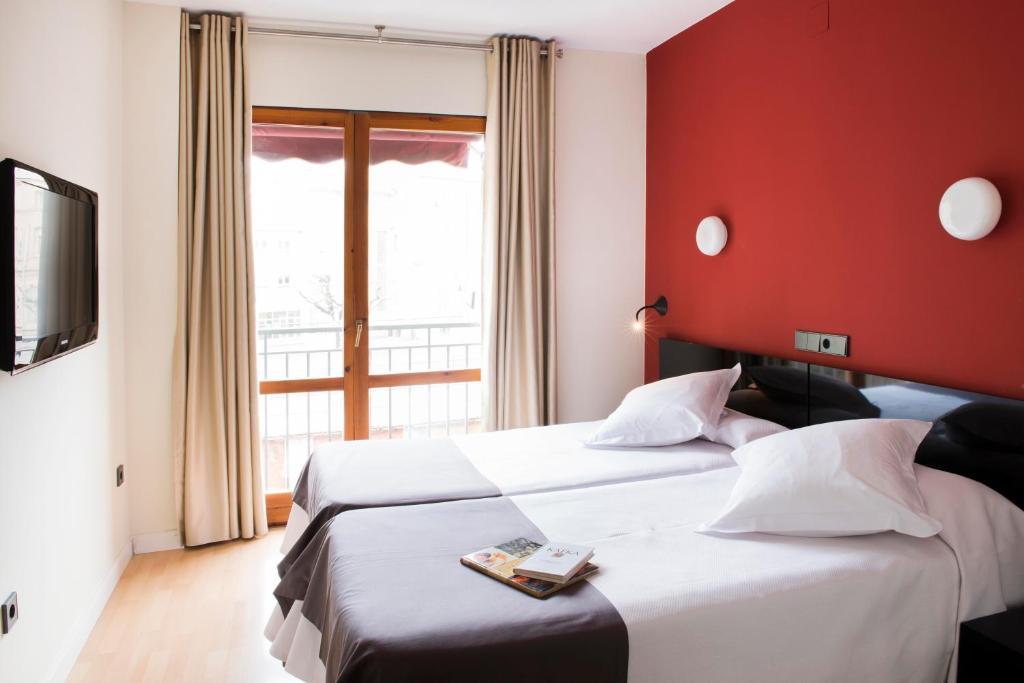 Hospedium Hostal Un Punto Chic Huesca Quarto foto